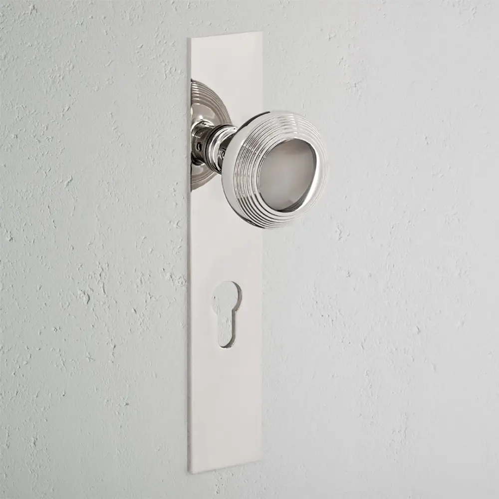 Poplar Generous Plate Sprung Door Knob & Euro Lock - Polished Nickel Complete Lock Set